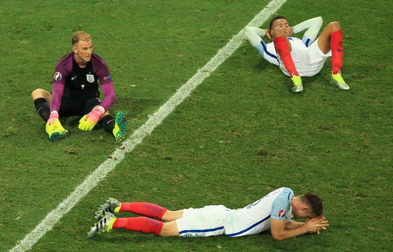 27 June 2016 - UEFA EURO 2016 - Round of 16 - England v Iceland - A dejected Joe Hart, Dele Alli and Gary Cahill of England - Photo: Marc Atkins / Offside.