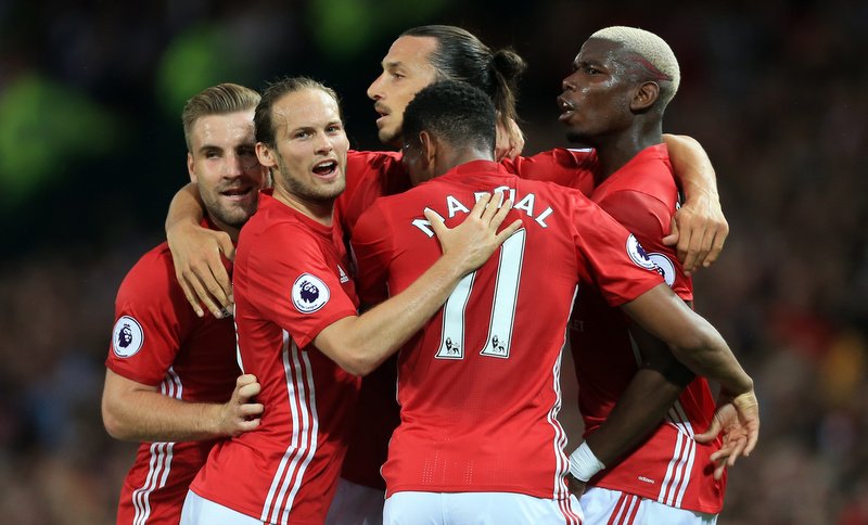 19th August 2016 - Premier League - Manchester United v Southampton - Zlatan Ibrahimovic of Man Utd (C) celebrates with teammates Luke Shaw (L), Daley Blind (2L), Anthony Martial (2R) and Paul Pogba (R) after scoring their 1st goal - Photo: Simon Stacpoole / Offside.