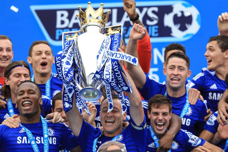 24 May 2015 - Barclays Premier League - Chelsea v Sunderland - John Terry of Chelsea lifts the premier league trophy among his team mates - Photo: Marc Atkins / Offside.